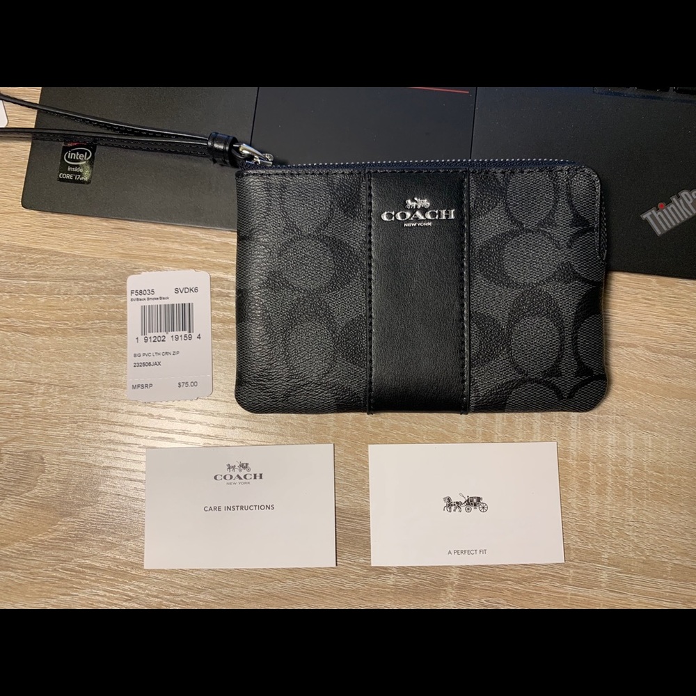 Coach Corner Zip Wristlet In Signature Canvas